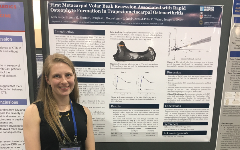 Leah Pipert standing in front of her poster