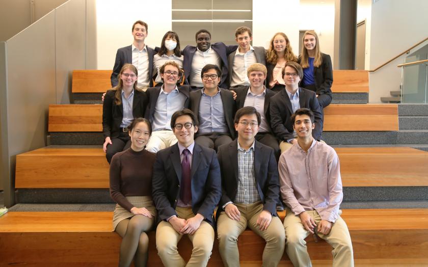 12 Undergraduates sit in rows 