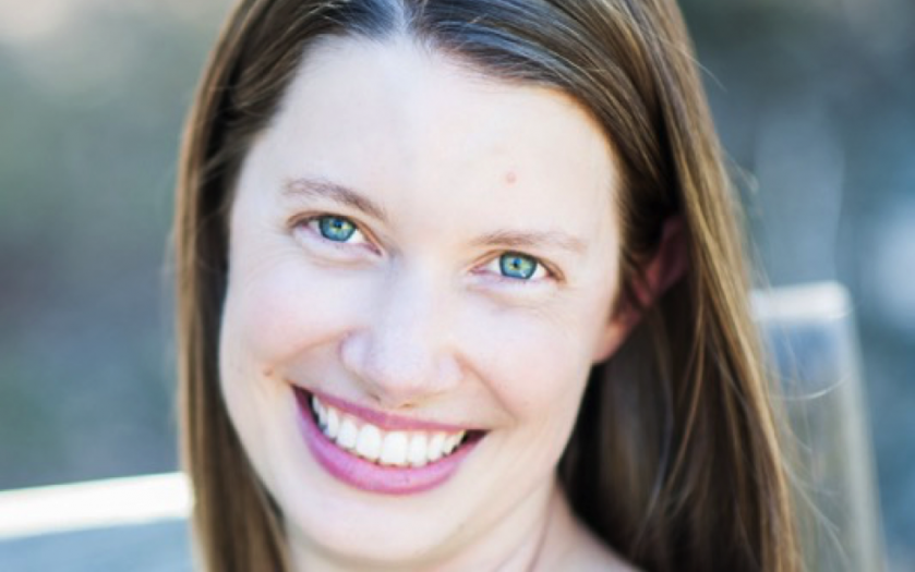 Bronwyn Harris headshot on a blurred background