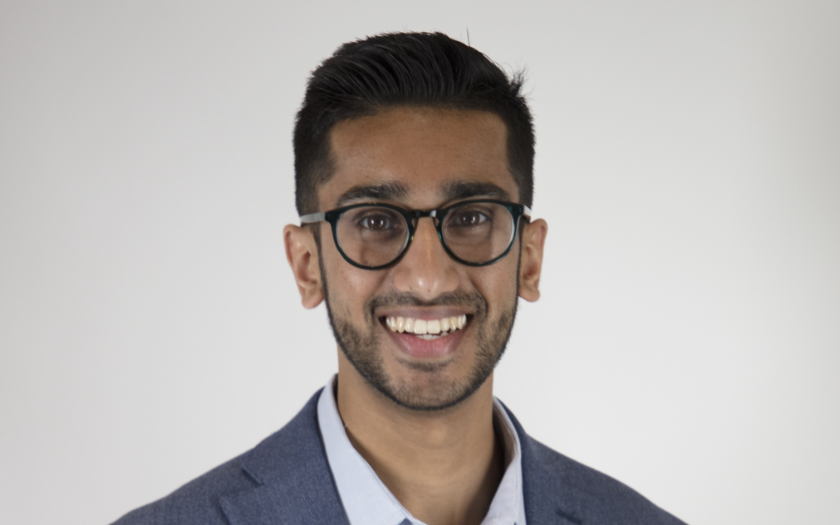 Faisal Khurshid headshot on a gray background