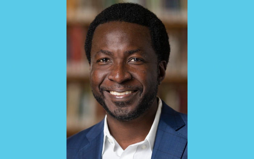 Kimani Toussaint headshot with blue borders