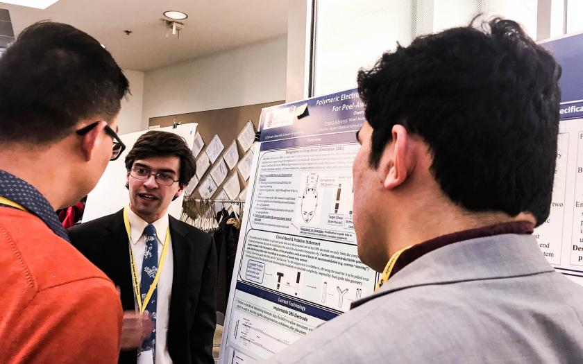 Owen Leary and Zakir Tahiry presenting their poster