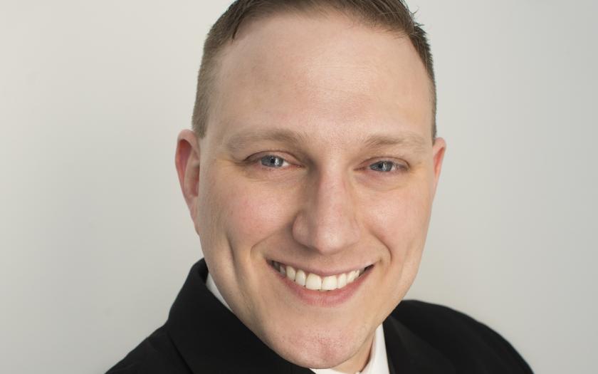 Headshot of Anthony Napolitano on a gray background