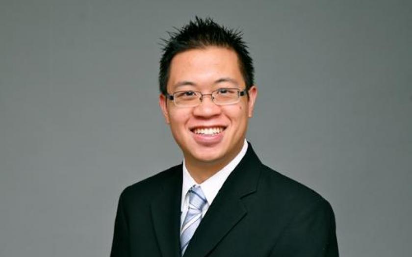 Ian Wong portrait in a gray background