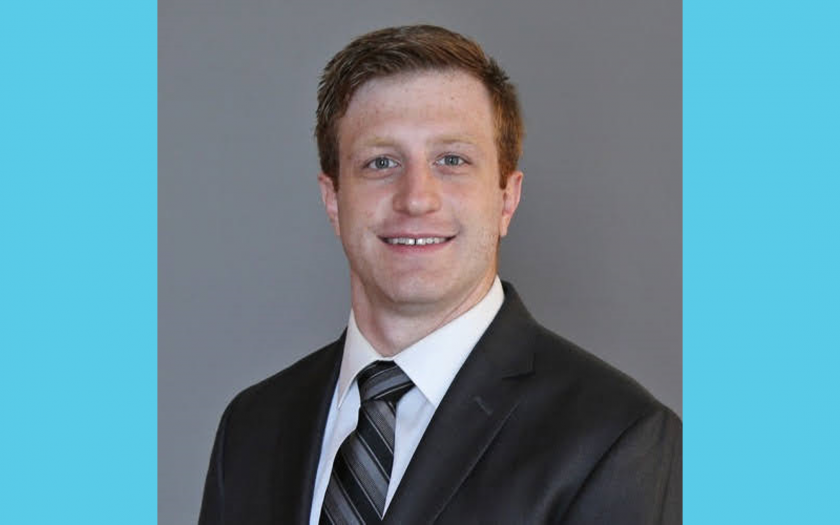 Portrait of Kevin LoGiudice with blue borders
