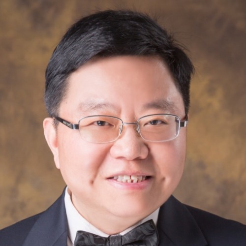 head and shoulders portrait of Qian Chen